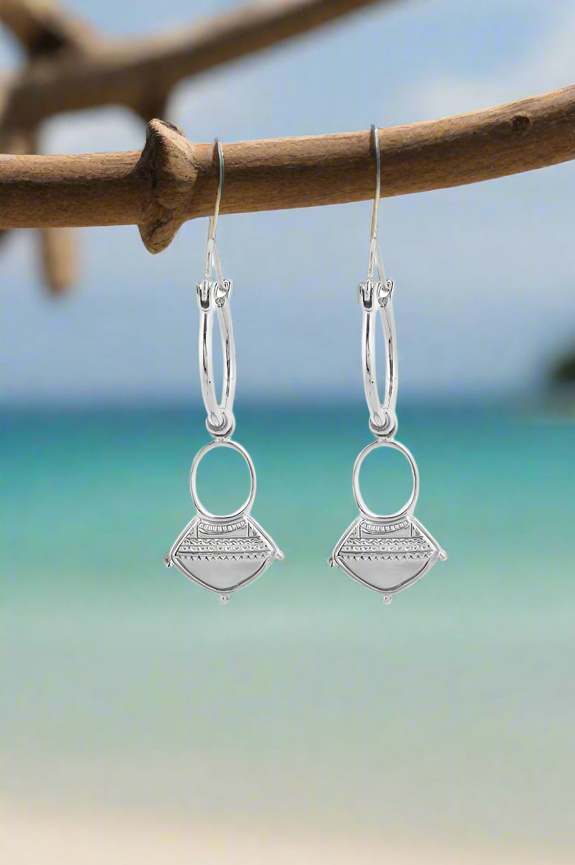 nakila aalia hoop earrings in white metal