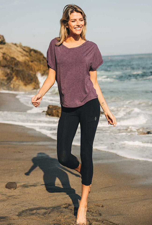 Nomads Oxygen Capris in black with woven cutout calf details and front thigh pockets.