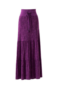 Purple tiered skirt on a white background