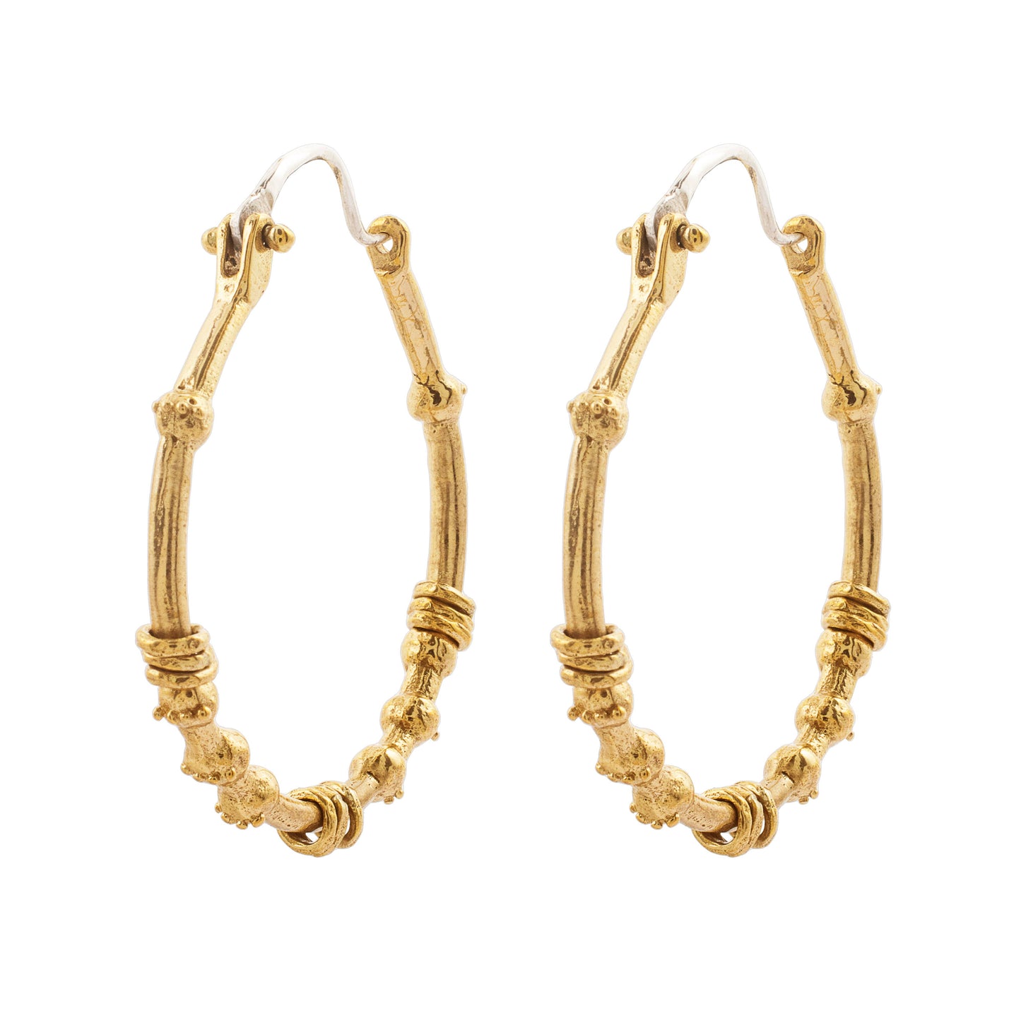 Ruhani Hoops - Brass close-up showing sculptural textured hoop detailing and sterling silver ear posts
