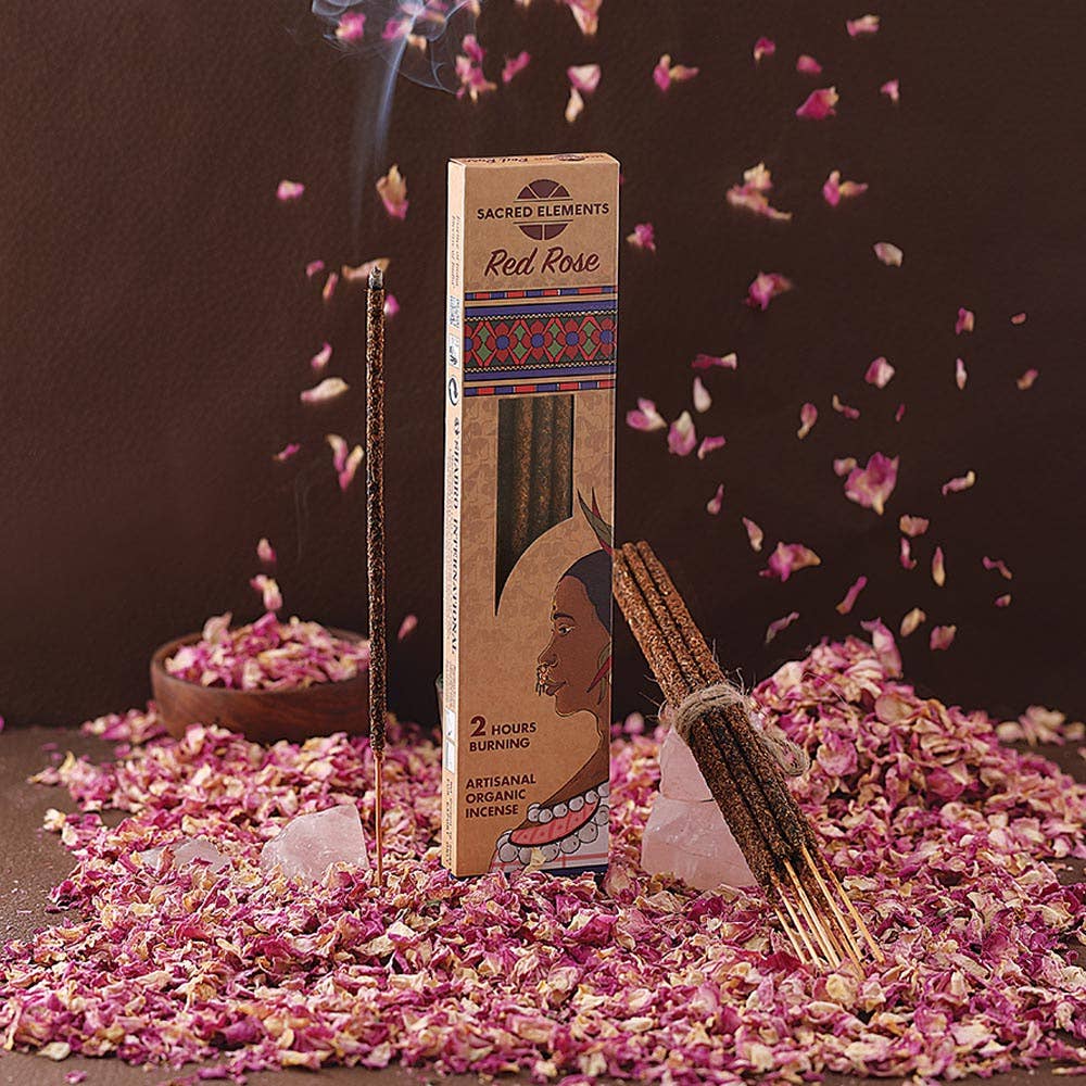Sacred Elements Red Rose artisanal organic incense box surrounded by dried rose petals