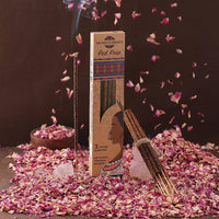 Sacred Elements Red Rose artisanal organic incense box surrounded by dried rose petals