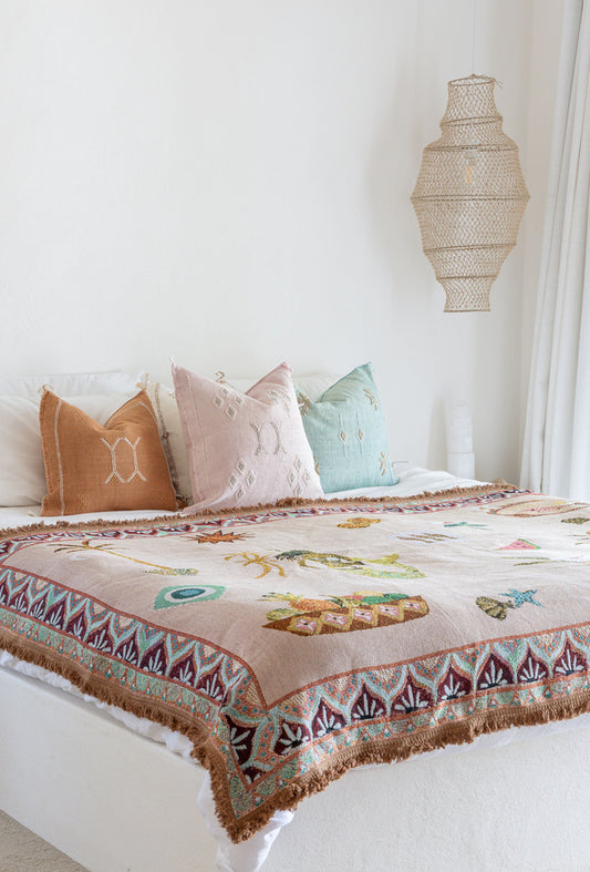 Sea Song Mermaid Art Throw Rug in soft pink with colourful mermaid and ocean-inspired woven designs