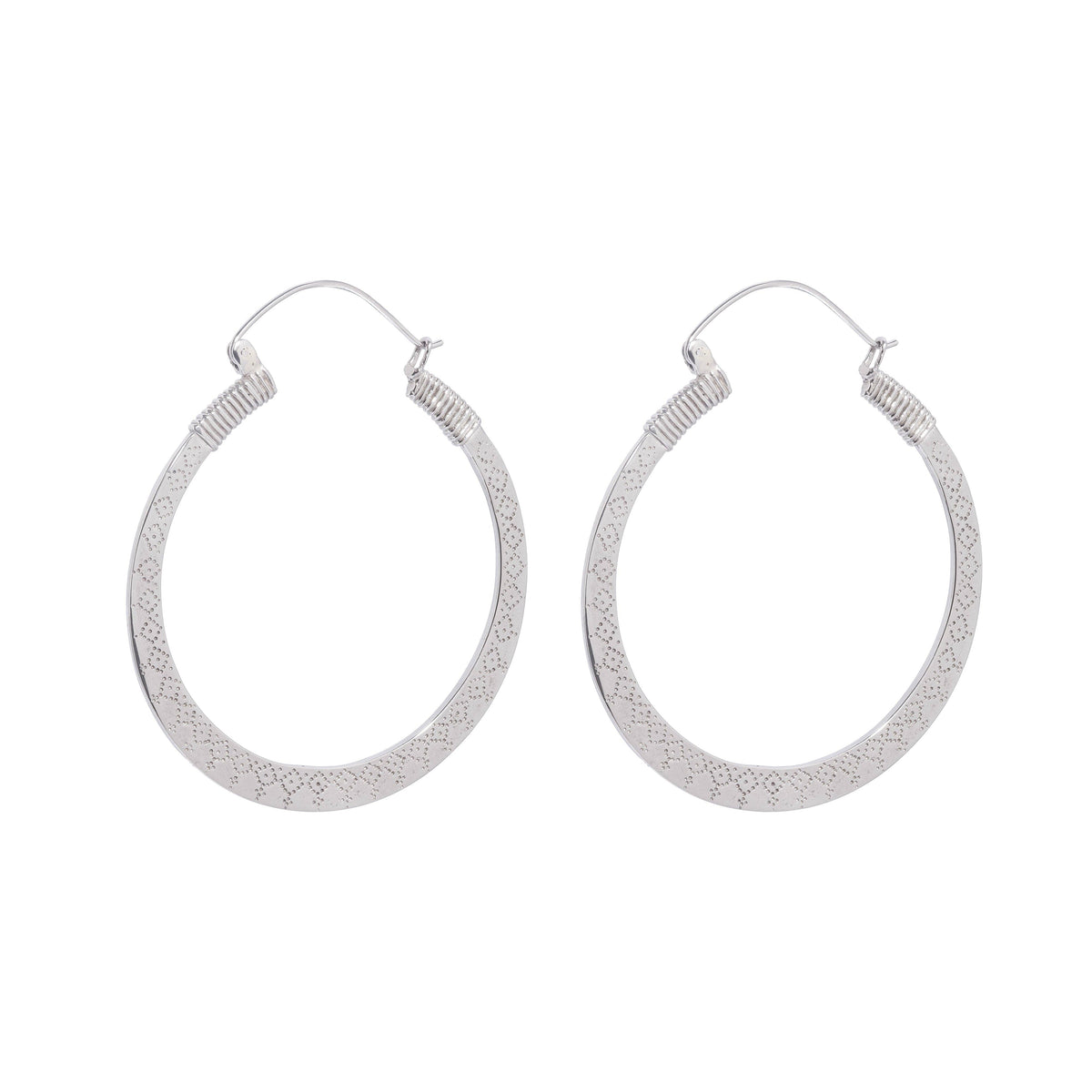 Shivani Hoops - White Brass large patterned hoop earrings on a white background