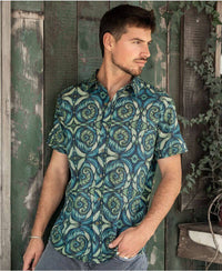 man wearing 100% cotton sprial leaves print button up shirt