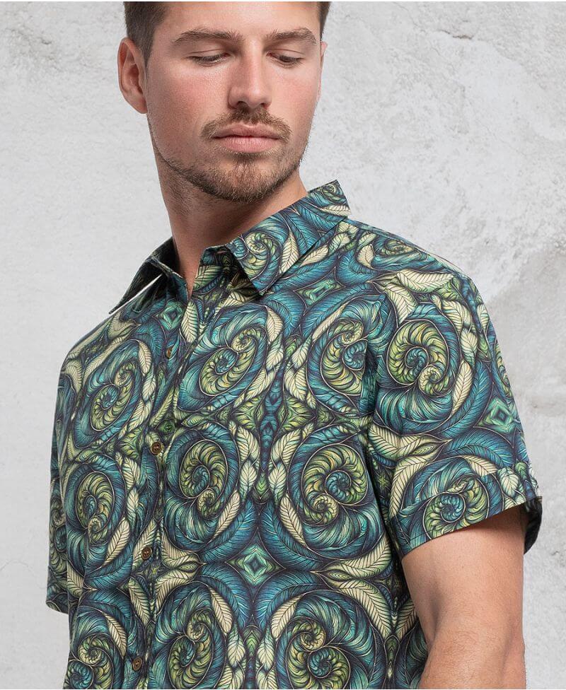 man wearing 100% cotton sprial leaves print button up shirt