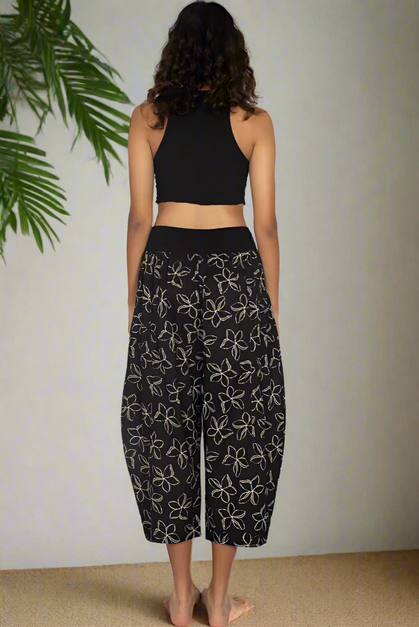 ladies wearing frangipani print cotton yoga pants
