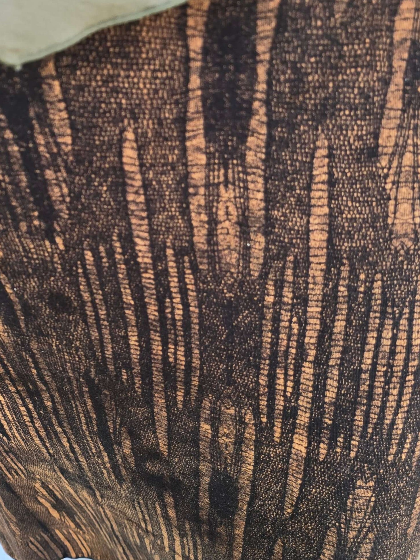 close up of brown long print skirt 