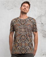 Men’s organic cotton T-shirt with psychedelic art, worn by model at music festival