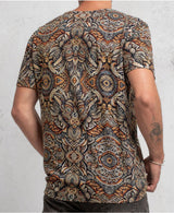 Men’s organic cotton T-shirt with psychedelic art, worn by model at music festival
